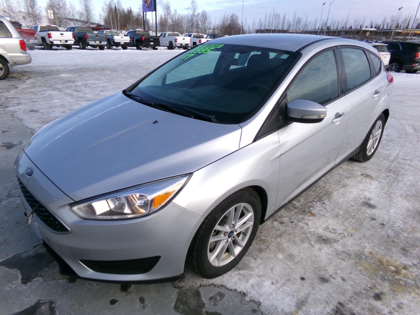 2017 Silver Ford Focus SE Hatch (1FADP3K26HL) with an 2.0L L4 DOHC 16V engine, located at 2630 Philips Field Rd., Fairbanks, AK, 99709, (907) 458-0593, 64.848068, -147.780609 - Photo#0